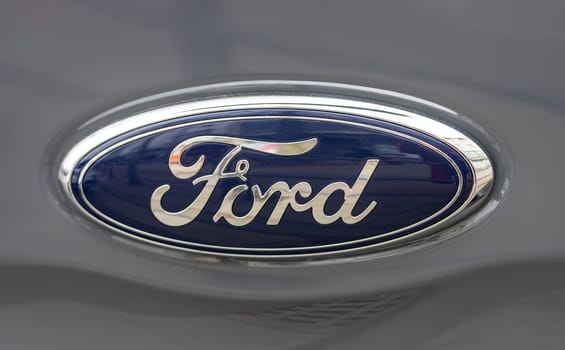 WETZLAR, GERMANY 2022-04-23: Ford logo on front of a car. Ford is an American multinational automaker that has its main headquarters in Detroit.