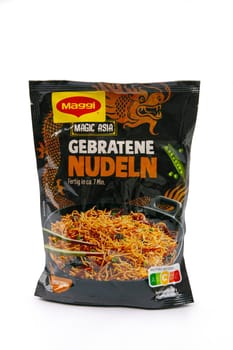 WETZLAR, GERMANY 2022-07-25: MAGGI Asia Instant Noodles.Maggi is an international brand of soups, stocks, bouillon cubes, ketchup, sauce.
