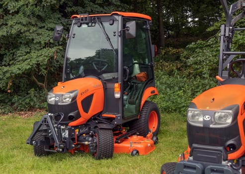 GERMANY - WETZLAR JULY 08: KUBOTA tractor lawn mower on a trade fair exhibition.