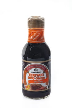 WETZLAR, GERMANY - 2022-07-17: Bottle of Kikkoman Teriyaki Sauce. In 1917 the Japanese Mogi and Takanashi families founded Noda Shoyu Co. Ltd. The company name was changed to Kikkoman Shoyu Co. Ltd. in 1964 and to Kikkoman Corporation in 1980.