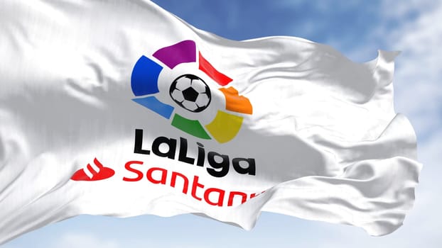 Madrid, SPA, July 2022: Close-up of the La Liga flag waving in the wind. La Liga is the men top professional football division of the Spanish football league system. Seamless loop in slow motion