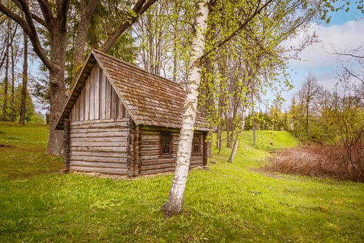 Old wooden bathhouse in the rural area....