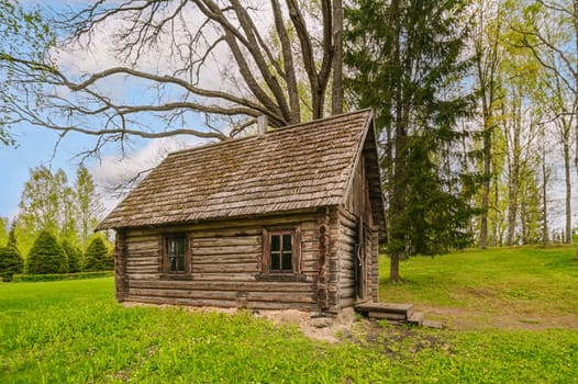 Old wooden bathhouse in the rural area....