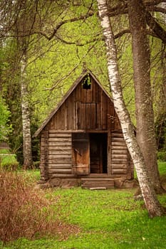 Old wooden bathhouse in the rural area....