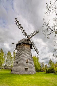 Old wooden windmill in the rural area