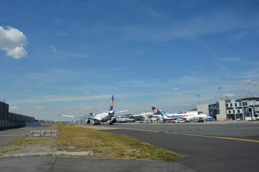 Frankfurt Airport Germany August 02, 2022 - Lufthansa machines at the terminal and on the runway