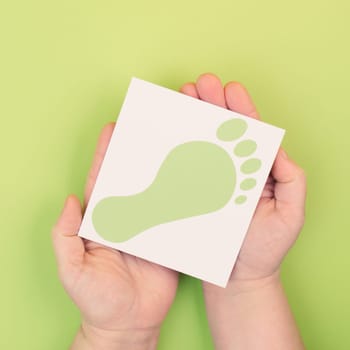 Green co2 footprint, carbon emission, climate change and global warming concept, eco friendly lifestyle