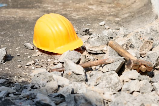 Safety Helmet in Construction Site. Yellow Hat. Safety Precautions Measures in Industrial workplace Background Concepts.