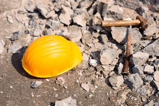Safety Helmet in Construction Site. Yellow Hat. Safety Precautions Measures in Industrial workplace Background Concepts.