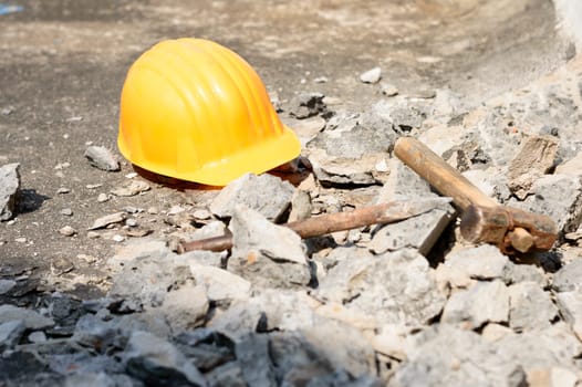 Safety Helmet in Construction Site. Yellow Hat. Safety Precautions Measures in Industrial workplace Background Concepts.