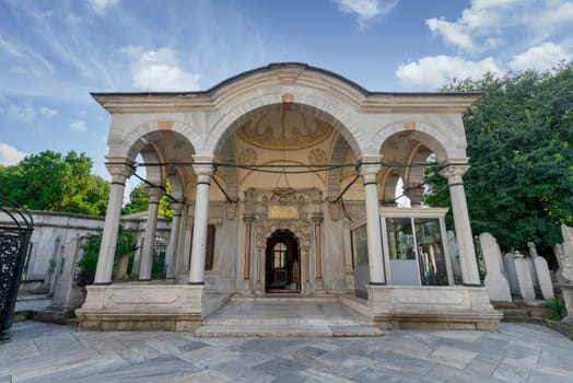White marble decorated Entrance of tombs at historic Eyup Cemetery, located in the Eyup district, on the European side of Istanbul, Turkey