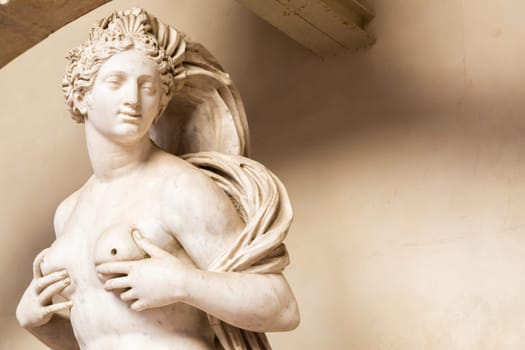 Florence, Italy - circa July 2021. Sensual naked woman statue. Beauty figure made of stone.