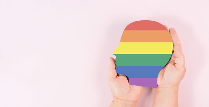 Head with rainbow colors, transgender and homesexual concept, lgtb awareness
