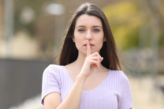 Teen asking for silence in a park