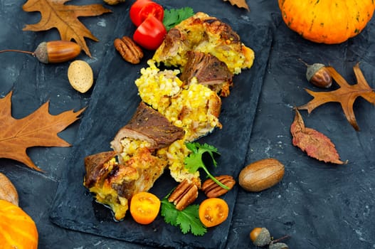 Tasty fried meat rolls stuffed with pumpkin. Autumn recipe.
