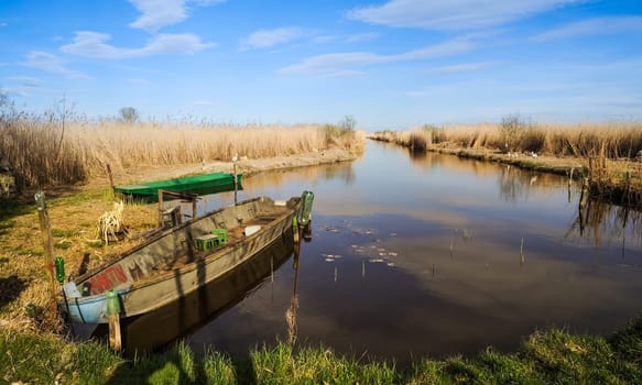 Old boat at canal on Lake Neusiedlersee