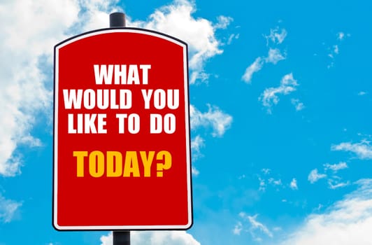 What Would You Like To Do Today? motivational quote written on red road sign isolated over clear blue sky background. Concept  image with available copy space