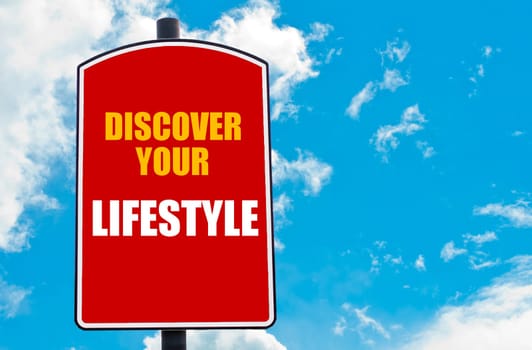 Discover Your Lifestyle motivational quote written on red road sign isolated over clear blue sky background. Concept  image with available copy space