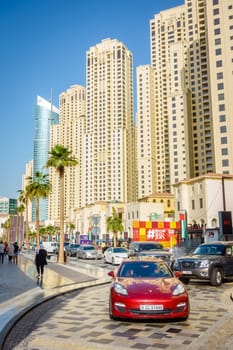 Dubai, UAE, February 23, 2018: Always busy Jumeirah Beach Residence (JBR) drive - a popular shopping, dining and entertainment destination