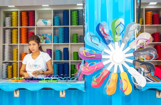 Dubai, UAE, February 23, 2018: Beach flip flop shop at the Jumeirah Beach Residence (JBR) Walk - a polular destination for food, shopping and entertainment