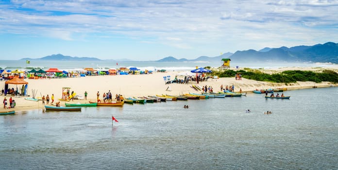 Guarda do Embau, January 14, 2022: Rio da Madre separating Praia Guarda do Embau beach from the mainland