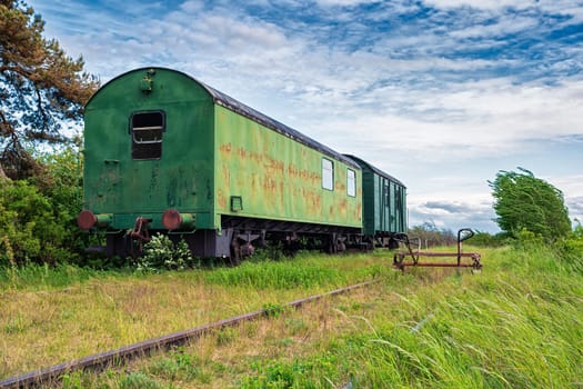 old wagons and tracks on the former railway line to Fischland-Darss, Bresewitz, Mecklenburg-Western Pomerania