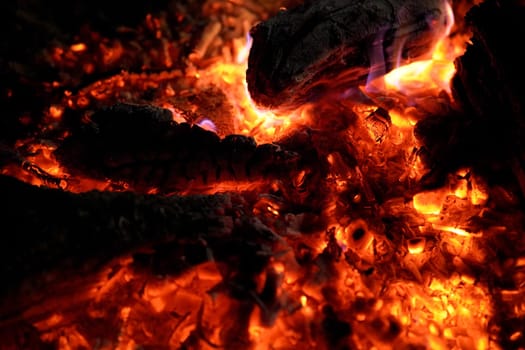 Fire and embers at the campfire
