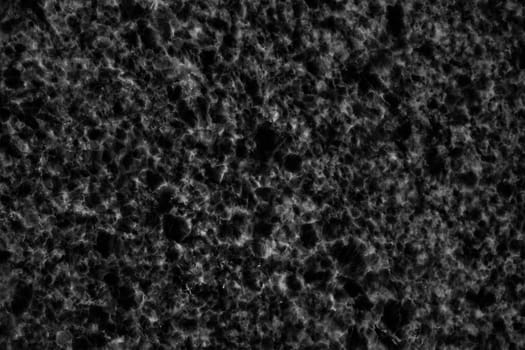 Black adstract backgound marble textured glow