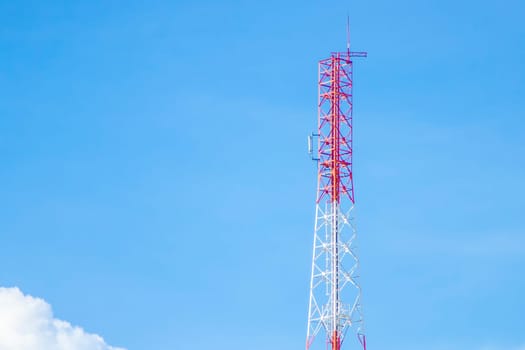 Communication tower transmission  with blue sky background