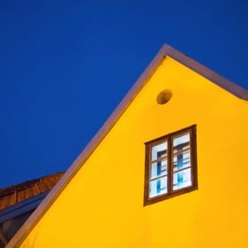 Zagreb yellow house in the evening with dark blue sky