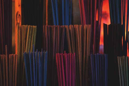 Colored sticks of incense with different frangrances