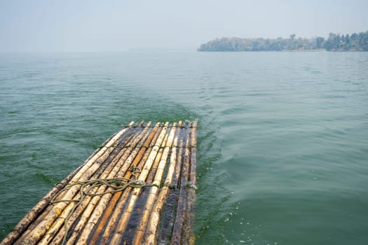 Bamboo raft floating in the river nature