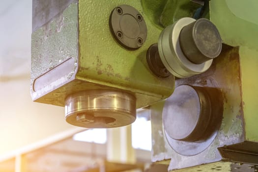 Machine workshop with drilling machine in morning