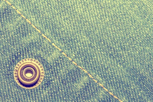 Blue jeans texture background and button and seam