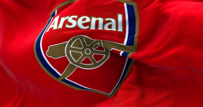 London, UK, May 2022: The flag of Arsenal Football Club waving. Arsenal is a professional football club based in Islington, London, England.