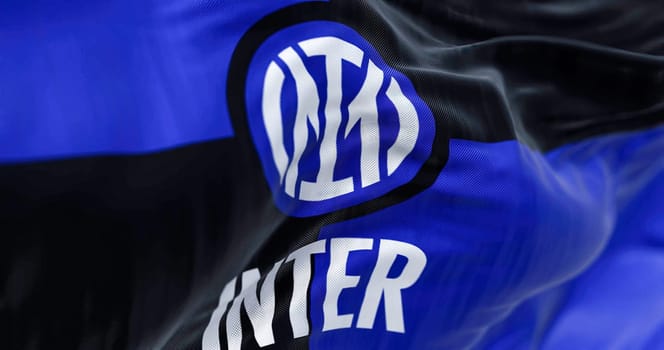 Milan, Italy, July 2022: The flag of Inter Football Club waving in the wind. Inter is a professional football club based in Milan, Italy