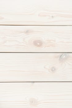 White striped planking. Wooden plank background for design and decoration. Copy space. Place for text. Light hardwood material. Horisontal row of floorboards. Wooden textured, natural tree. Vertical