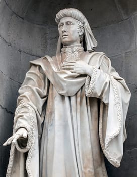 Barcelona, Spain - Dec 29th 2019: Counselor of Council of One Hundred men or Consell de Cent, Barcelona, Spain. Exterior statue at Barcelona City Hall Building. Catalonia, Spain