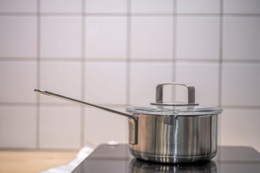 The pot is on the electric stove