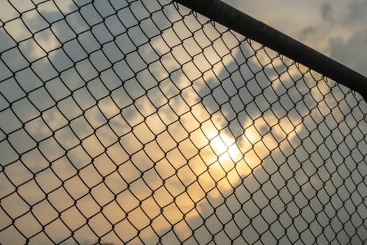 Chain link fence In the evening or sunset