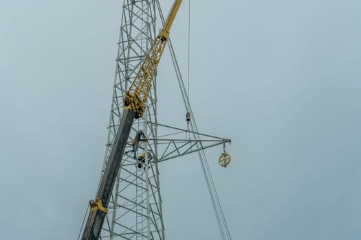 Use crane to lift the light bulbs to repair the light pole