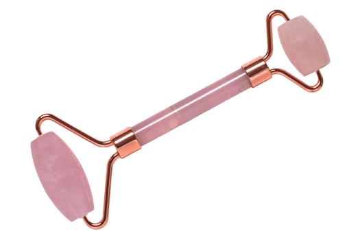 Gua Sha massage tools. Close-up of a pink jade facial roller or beauty roller for better blood circulation and muscle activation. Clipping path. Beauty concept. Isolated on white.