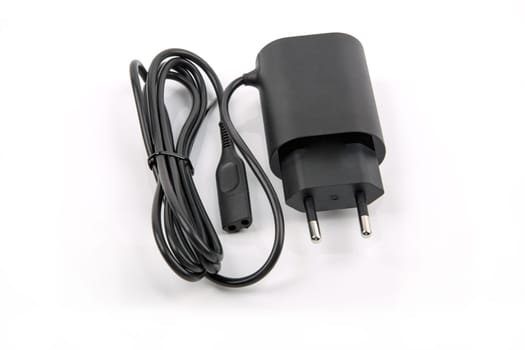 Black Power Adapter over bright background