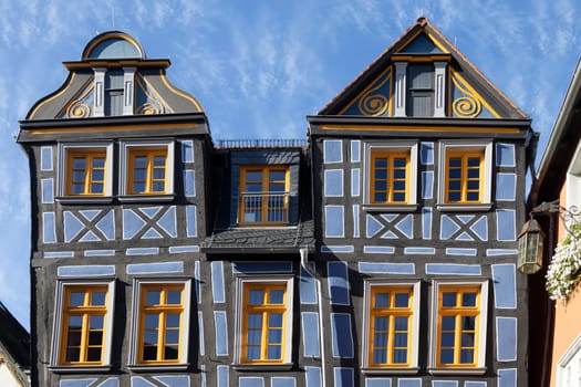 Historic half timbered house facade with windows in the idyllic little Town Idstein Hesse Germany.