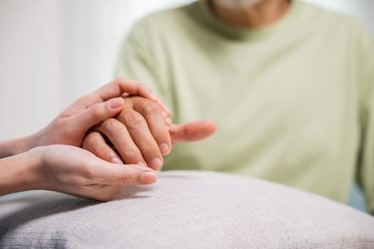 International Day for the Elderly. Young woman helping hands offering her senior man at home, Caring nurse helping elderly old man care facility gets help from hospital, old aged, medical healthcare