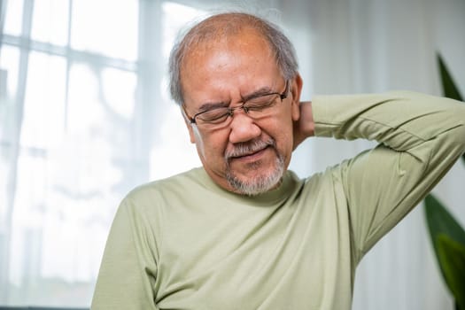Old man suffering from nape neck pain at home, Elderly acute neckaches, Sad senior man neckache hand holding neck, Old age retirement health problems unhealthy diseased, shoulder pain