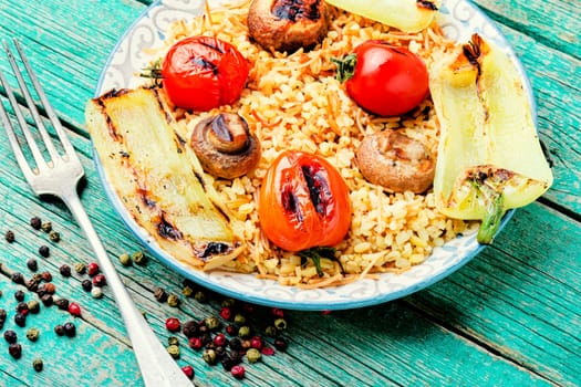 Grilled tomato, bell pepper and grilled mushroom lunch with rice for garnish