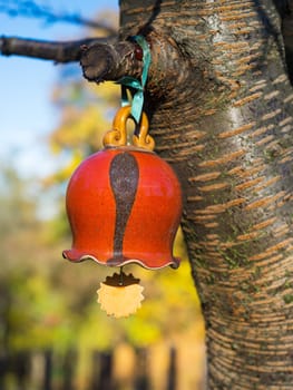 ancient and retro bell hang on a tree