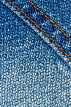 Blue jeans texture background and button and seam