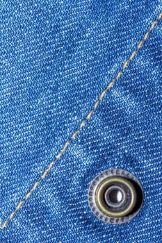 Blue jeans texture background and button and seam